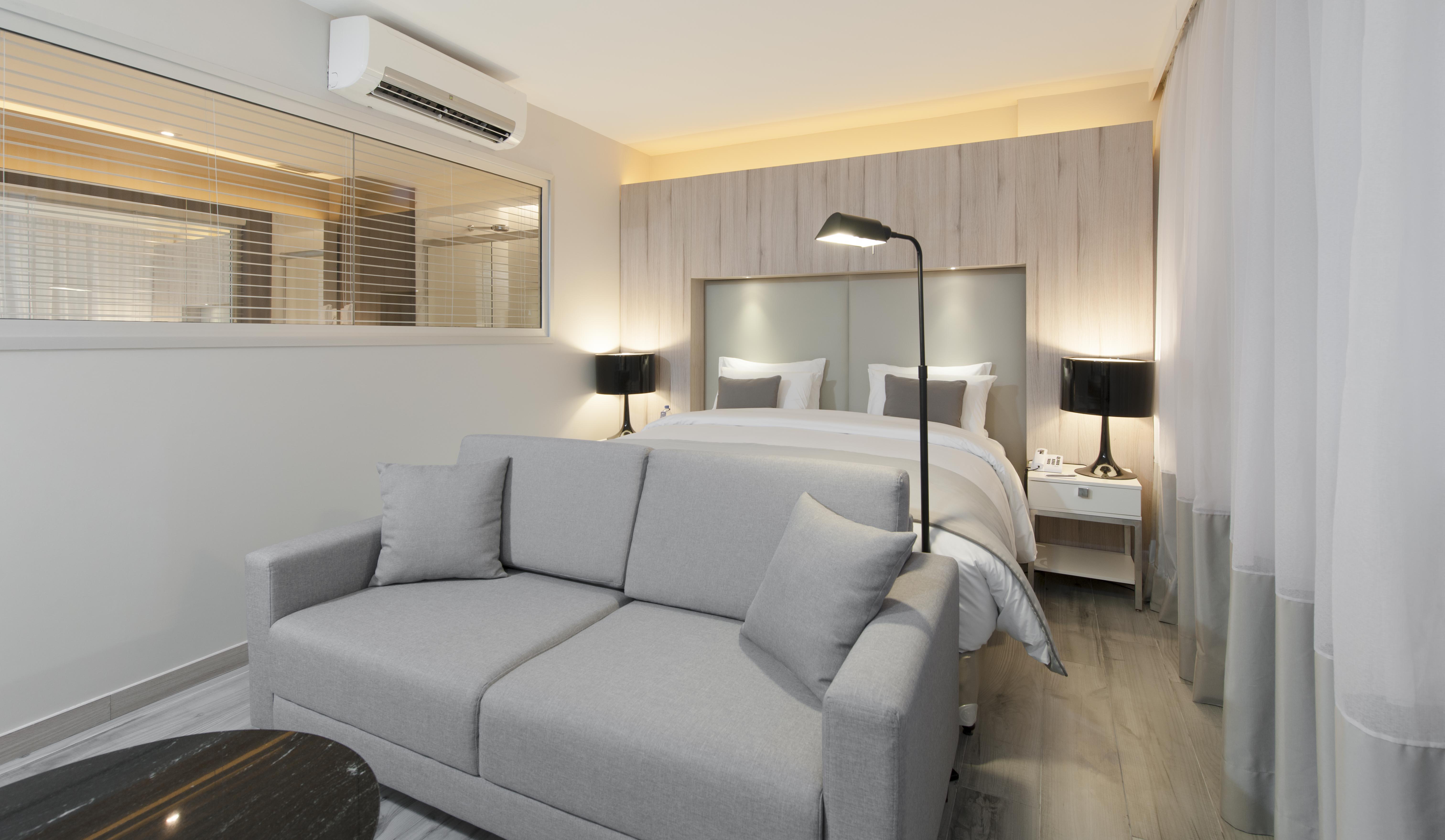 Hotel Radisson Blu Belo Horizonte Savassi Zewnętrze zdjęcie A bedroom in a serviced apartment in Hong Kong